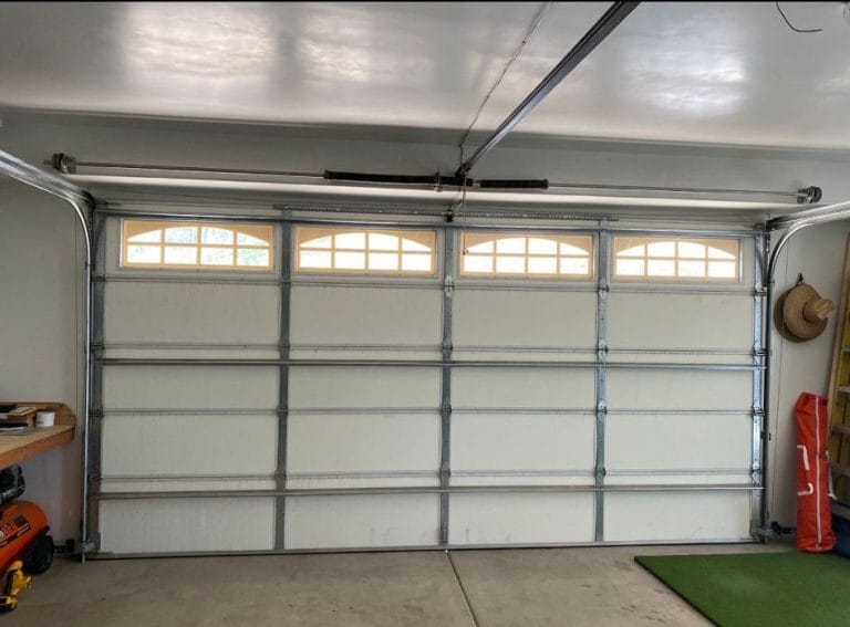Garage door with window panels seen from inside