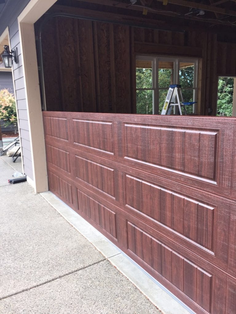 Wood look garage door panels up close