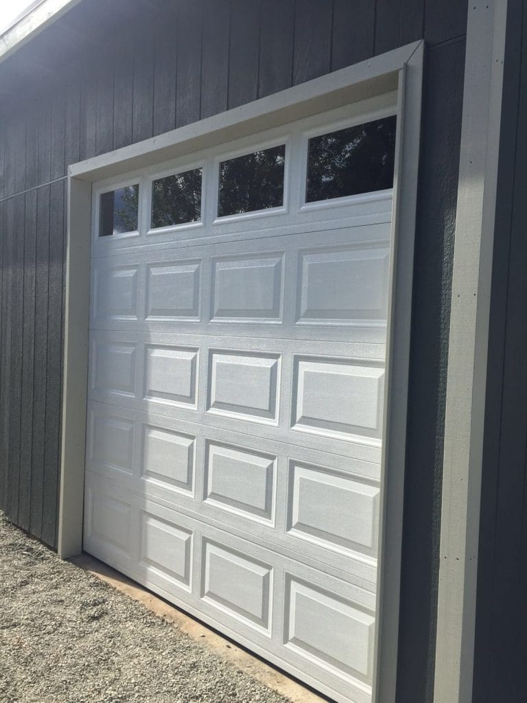 Gray garage door with raised panels